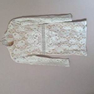Never worn, very beautiful white lace dress with nude underlayer
